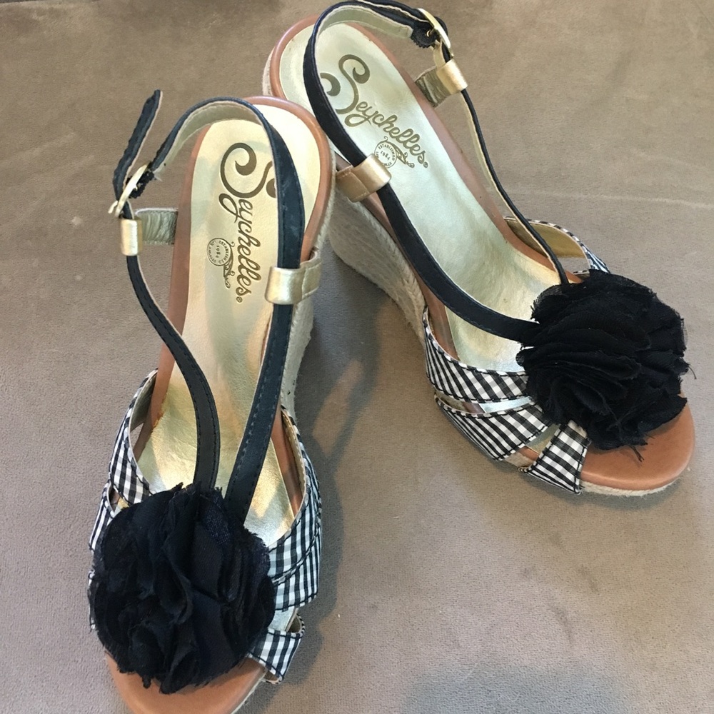 Black and white gingham wedge sandals.